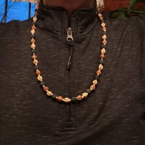 Natural seed bead necklace from South Carolina marketplace, varying brown shades
